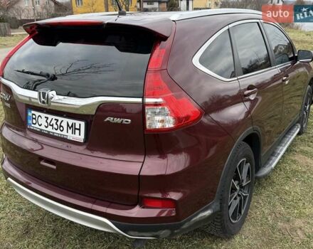 Красный Хонда СРВ, объемом двигателя 2.36 л и пробегом 80 тыс. км за 17000 $, фото 7 на Automoto.ua