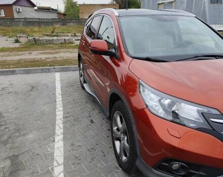 Красный Хонда СРВ, объемом двигателя 2.2 л и пробегом 147 тыс. км за 22000 $, фото 5 на Automoto.ua