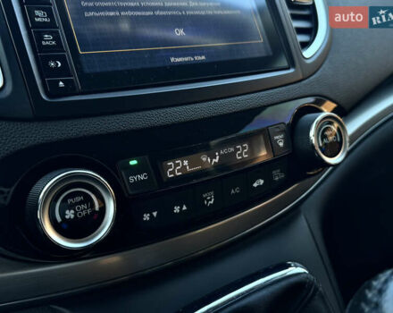 Красный Хонда СРВ, объемом двигателя 1.6 л и пробегом 121 тыс. км за 21700 $, фото 19 на Automoto.ua