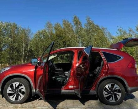 Красный Хонда СРВ, объемом двигателя 2 л и пробегом 180 тыс. км за 10200 $, фото 4 на Automoto.ua