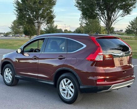 Красный Хонда СРВ, объемом двигателя 2.4 л и пробегом 77 тыс. км за 9000 $, фото 6 на Automoto.ua