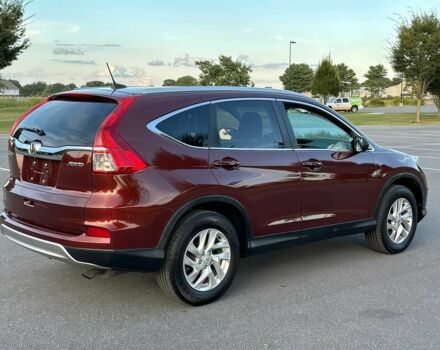 Красный Хонда СРВ, объемом двигателя 2.4 л и пробегом 77 тыс. км за 9000 $, фото 4 на Automoto.ua
