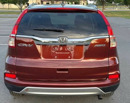 Красный Хонда СРВ, объемом двигателя 2.4 л и пробегом 77 тыс. км за 9000 $, фото 5 на Automoto.ua