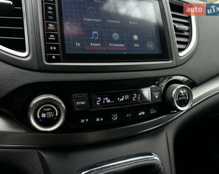 Красный Хонда СРВ, объемом двигателя 1.6 л и пробегом 238 тыс. км за 15500 $, фото 51 на Automoto.ua