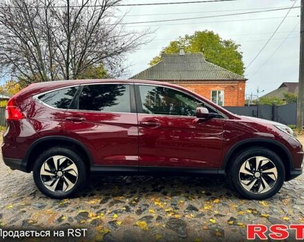 Красный Хонда СРВ, объемом двигателя 2.4 л и пробегом 128 тыс. км за 16550 $, фото 2 на Automoto.ua