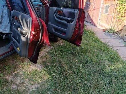 Червоний Хонда СРВ, об'ємом двигуна 2 л та пробігом 300 тис. км за 3900 $, фото 1 на Automoto.ua