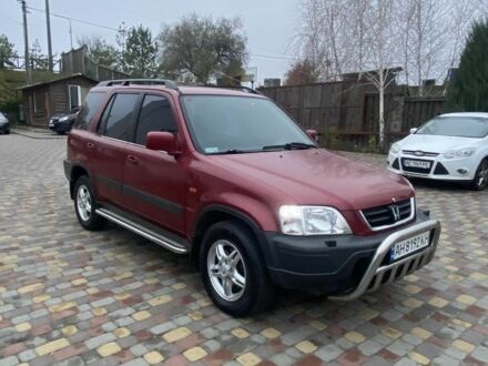 Красный Хонда СРВ, объемом двигателя 2 л и пробегом 217 тыс. км за 5100 $, фото 1 на Automoto.ua