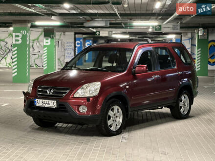 Красный Хонда СРВ, объемом двигателя 2 л и пробегом 257 тыс. км за 7300 $, фото 1 на Automoto.ua