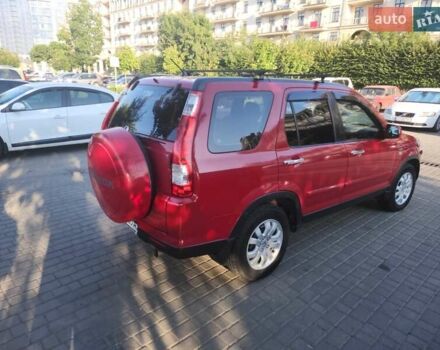 Красный Хонда СРВ, объемом двигателя 2 л и пробегом 225 тыс. км за 7450 $, фото 1 на Automoto.ua