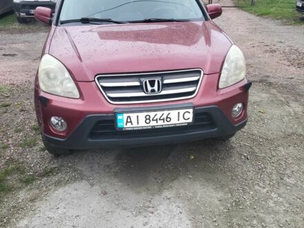 Красный Хонда СРВ, объемом двигателя 2 л и пробегом 257 тыс. км за 6876 $, фото 1 на Automoto.ua