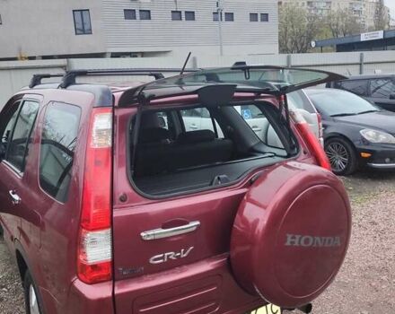 Красный Хонда СРВ, объемом двигателя 2 л и пробегом 257 тыс. км за 6876 $, фото 1 на Automoto.ua