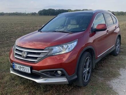 Красный Хонда СРВ, объемом двигателя 2.2 л и пробегом 210 тыс. км за 16800 $, фото 1 на Automoto.ua