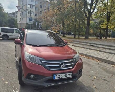 Красный Хонда СРВ, объемом двигателя 2.2 л и пробегом 257 тыс. км за 16900 $, фото 1 на Automoto.ua