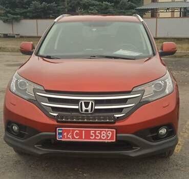 Красный Хонда СРВ, объемом двигателя 2.2 л и пробегом 209 тыс. км за 16950 $, фото 1 на Automoto.ua