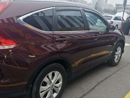 Красный Хонда СРВ, объемом двигателя 2.36 л и пробегом 158 тыс. км за 15600 $, фото 1 на Automoto.ua