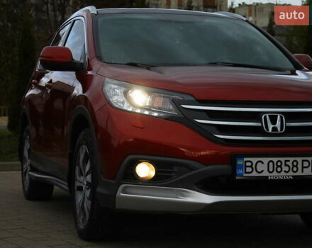 Красный Хонда СРВ, объемом двигателя 2.2 л и пробегом 183 тыс. км за 18200 $, фото 1 на Automoto.ua