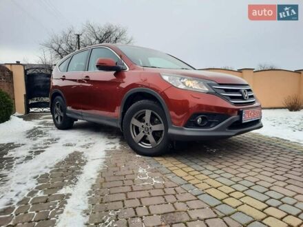 Червоний Хонда СРВ, об'ємом двигуна 2.2 л та пробігом 206 тис. км за 17650 $, фото 1 на Automoto.ua