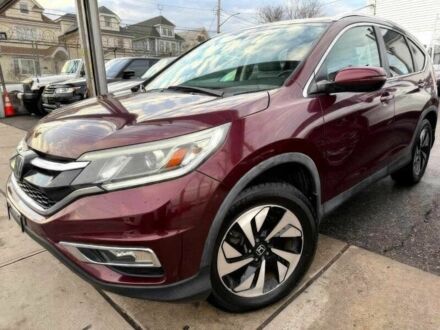 Красный Хонда СРВ, объемом двигателя 2.4 л и пробегом 73 тыс. км за 16300 $, фото 1 на Automoto.ua