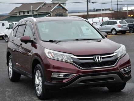 Красный Хонда СРВ, объемом двигателя 2.4 л и пробегом 71 тыс. км за 9900 $, фото 1 на Automoto.ua