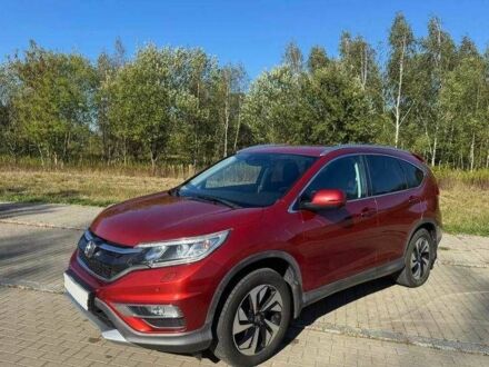 Красный Хонда СРВ, объемом двигателя 2 л и пробегом 180 тыс. км за 10200 $, фото 1 на Automoto.ua