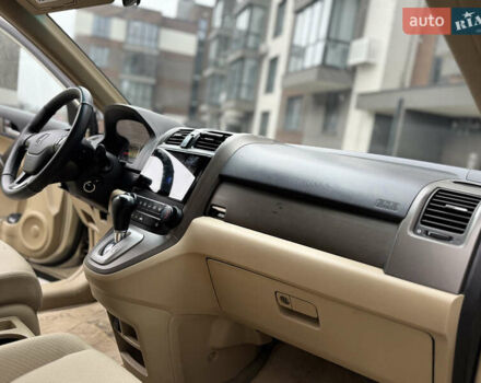 Желтый Хонда СРВ, объемом двигателя 2.4 л и пробегом 297 тыс. км за 8990 $, фото 24 на Automoto.ua