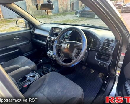 Серый Хонда СРВ, объемом двигателя 2.2 л и пробегом 233 тыс. км за 3000 $, фото 6 на Automoto.ua