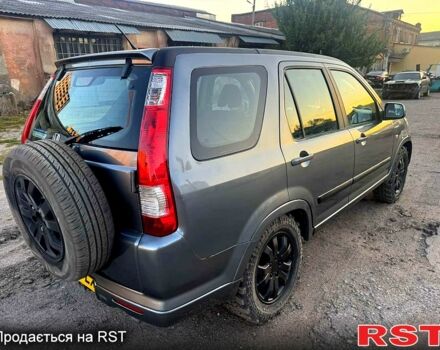 Серый Хонда СРВ, объемом двигателя 2.2 л и пробегом 233 тыс. км за 3000 $, фото 4 на Automoto.ua