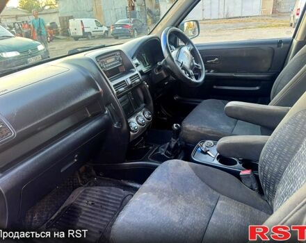 Серый Хонда СРВ, объемом двигателя 2.2 л и пробегом 233 тыс. км за 3000 $, фото 7 на Automoto.ua