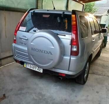 Серый Хонда СРВ, объемом двигателя 2 л и пробегом 230 тыс. км за 7600 $, фото 1 на Automoto.ua