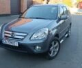 Серый Хонда СРВ, объемом двигателя 2.2 л и пробегом 260 тыс. км за 7000 $, фото 1 на Automoto.ua