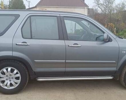 Серый Хонда СРВ, объемом двигателя 2 л и пробегом 256 тыс. км за 7500 $, фото 6 на Automoto.ua