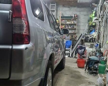 Серый Хонда СРВ, объемом двигателя 2 л и пробегом 166 тыс. км за 10000 $, фото 1 на Automoto.ua