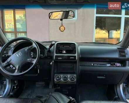 Серый Хонда СРВ, объемом двигателя 2 л и пробегом 251 тыс. км за 7500 $, фото 6 на Automoto.ua