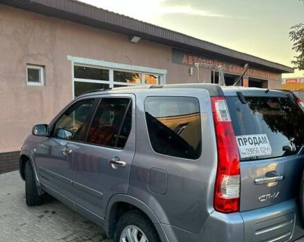 Серый Хонда СРВ, объемом двигателя 2 л и пробегом 251 тыс. км за 7500 $, фото 1 на Automoto.ua