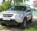 Серый Хонда СРВ, объемом двигателя 2.4 л и пробегом 202 тыс. км за 4500 $, фото 1 на Automoto.ua