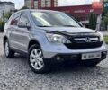 Серый Хонда СРВ, объемом двигателя 2 л и пробегом 235 тыс. км за 8555 $, фото 1 на Automoto.ua