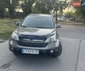 Серый Хонда СРВ, объемом двигателя 2.4 л и пробегом 175 тыс. км за 9300 $, фото 1 на Automoto.ua