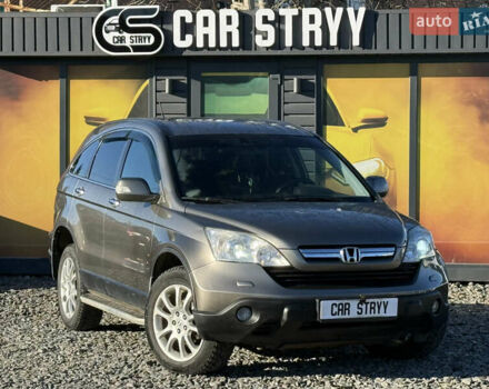 Серый Хонда СРВ, объемом двигателя 2.4 л и пробегом 214 тыс. км за 9500 $, фото 1 на Automoto.ua