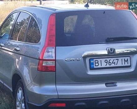 Серый Хонда СРВ, объемом двигателя 2.35 л и пробегом 221 тыс. км за 11000 $, фото 1 на Automoto.ua