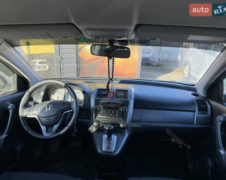 Серый Хонда СРВ, объемом двигателя 2.4 л и пробегом 214 тыс. км за 9500 $, фото 4 на Automoto.ua