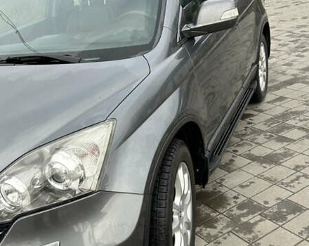 Серый Хонда СРВ, объемом двигателя 2.4 л и пробегом 225 тыс. км за 10900 $, фото 6 на Automoto.ua