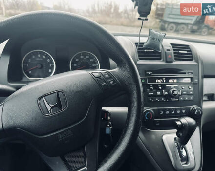 Серый Хонда СРВ, объемом двигателя 2.35 л и пробегом 179 тыс. км за 10900 $, фото 4 на Automoto.ua