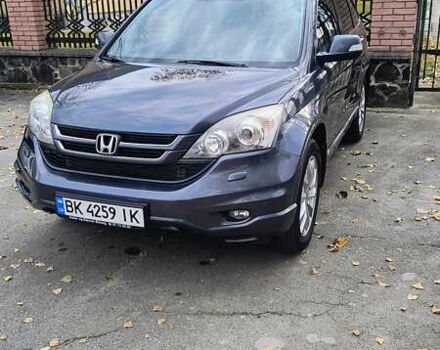 Серый Хонда СРВ, объемом двигателя 2 л и пробегом 230 тыс. км за 12500 $, фото 4 на Automoto.ua