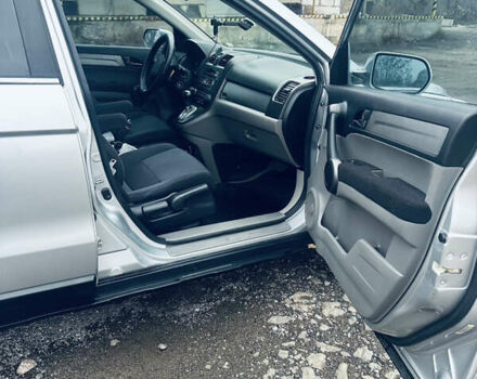 Серый Хонда СРВ, объемом двигателя 2.35 л и пробегом 179 тыс. км за 10900 $, фото 1 на Automoto.ua