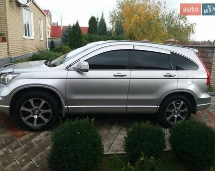 Серый Хонда СРВ, объемом двигателя 2.4 л и пробегом 145 тыс. км за 16000 $, фото 1 на Automoto.ua