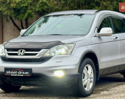 Серый Хонда СРВ, объемом двигателя 2 л и пробегом 175 тыс. км за 12299 $, фото 4 на Automoto.ua