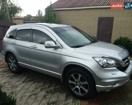 Серый Хонда СРВ, объемом двигателя 2.4 л и пробегом 145 тыс. км за 16000 $, фото 2 на Automoto.ua