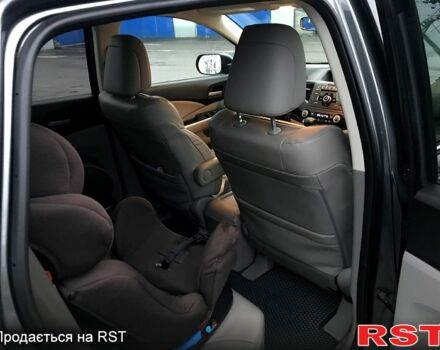 Серый Хонда СРВ, объемом двигателя 2.4 л и пробегом 135 тыс. км за 14000 $, фото 3 на Automoto.ua