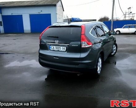 Серый Хонда СРВ, объемом двигателя 2.4 л и пробегом 135 тыс. км за 14000 $, фото 1 на Automoto.ua