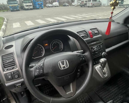 Серый Хонда СРВ, объемом двигателя 2.35 л и пробегом 179 тыс. км за 13600 $, фото 6 на Automoto.ua